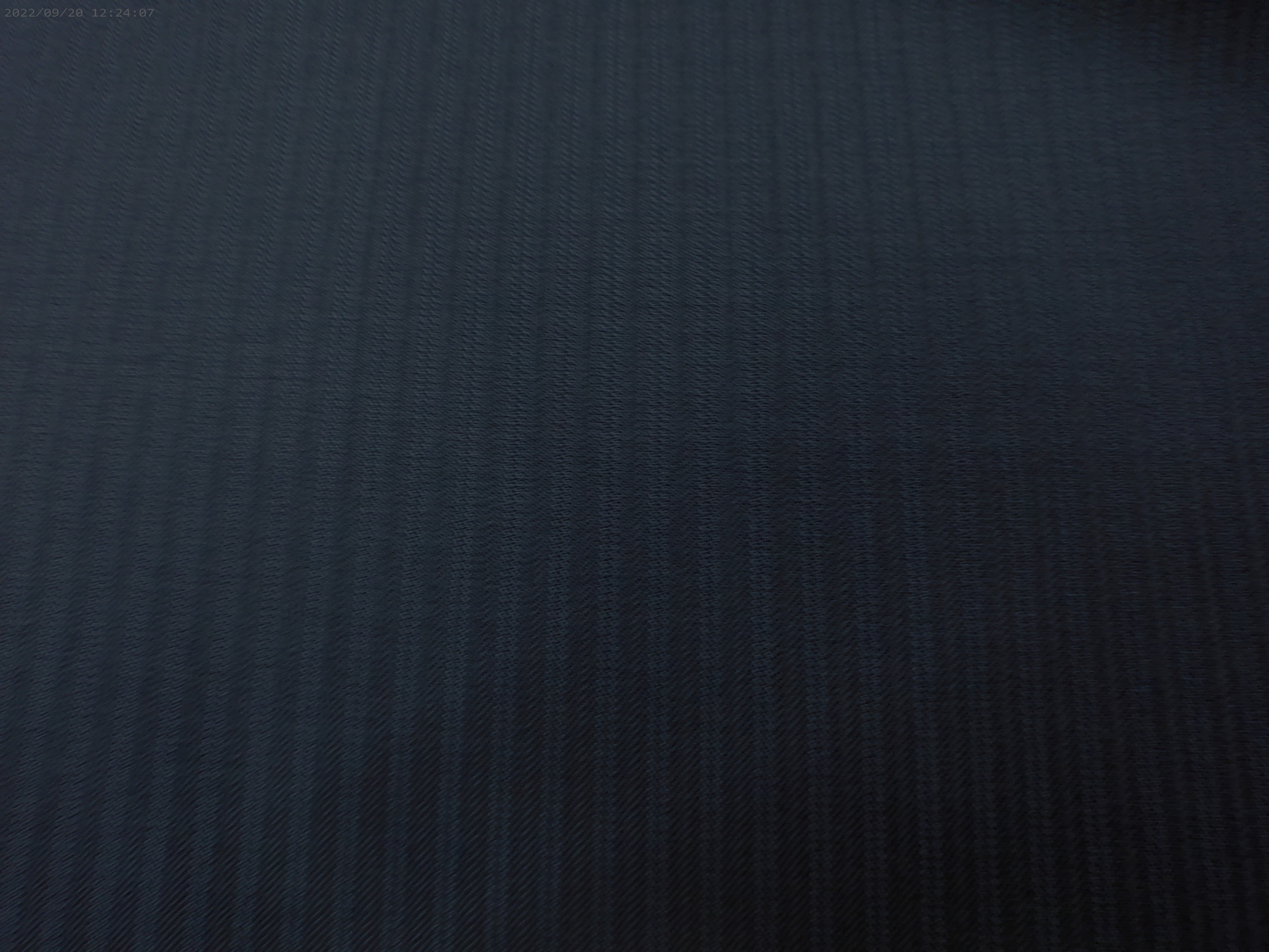 Blue Stripe On A Navy Wool Suiting Fabric