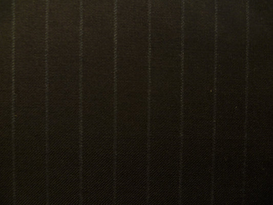 100% Wool worsted. Tropical weight ,